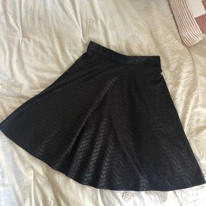 Black geometric midi skirt